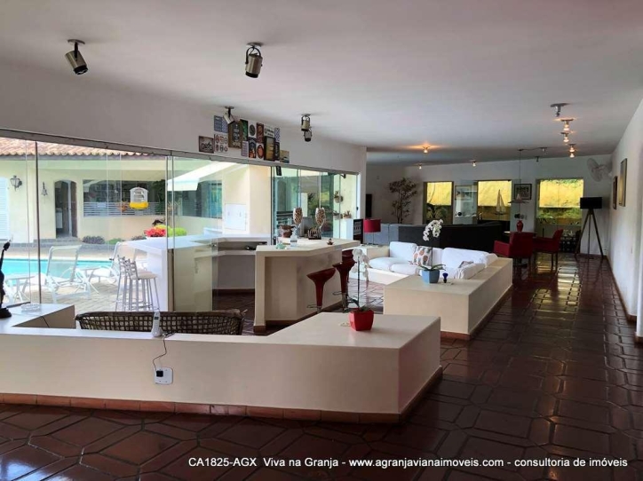 Casa de Condomínio à venda e aluguel com 4 quartos, 578m² - Foto 1